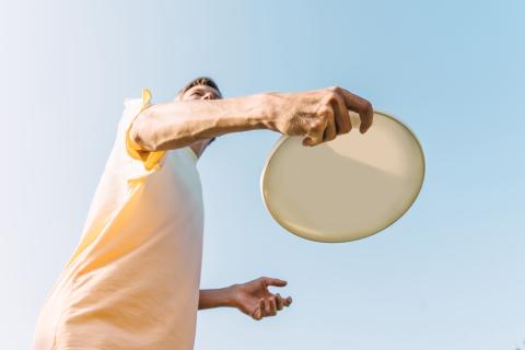 Man throwing frisbee